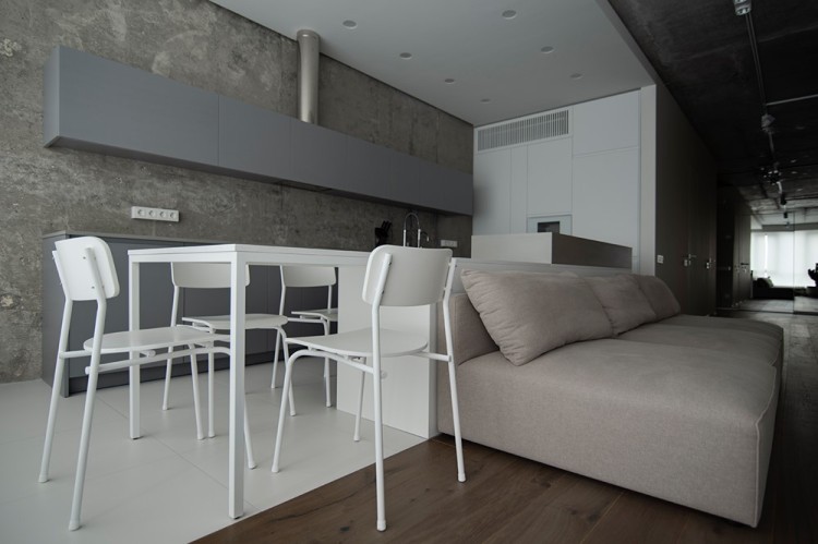 Современный дизайн интерьера кухни-столовой квартиры в минималистичном стиле